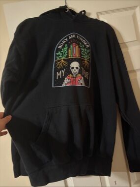 Black Graphic Pullover Hoodie with Skeleton Book Design